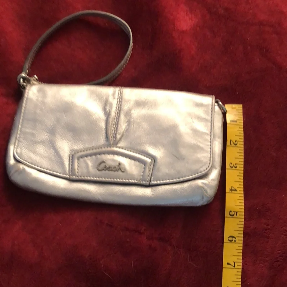 Coach  silver metallic genuine leather large wristlet or clutch 9” long  …